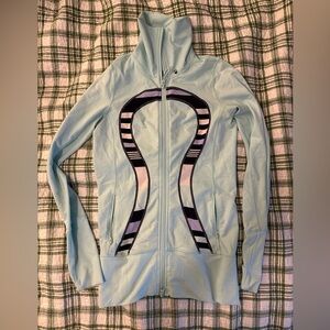Light Blue Zip-Up Jacket with Lulu logo. Missing tag.